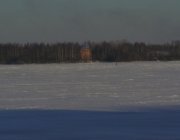Монастырский остров и воссозданная угловая башня бывшего Троицкого монастыря зимой